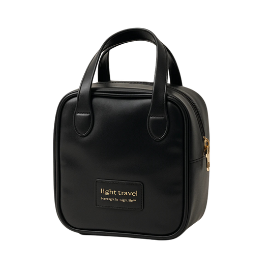 Cosmetiquera de mano compacta negra con acabado elegante – Light Travel