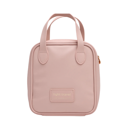 Cosmetiquera de mano compacta rosada con acabado elegante – Light Travel